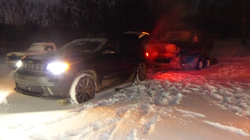 Illustration for article titled Towing An Old Jeep Through An Ice Storm With A 707 HP Jeep Grand Cherokee Trackhawk Was Truly Terrifying